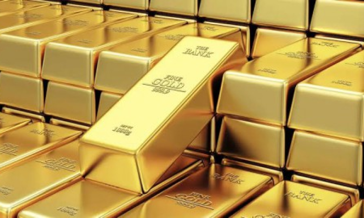 الذهب يتراجع وسط تهدئة تجارية وتراجع الدولار يحد من الخسائر